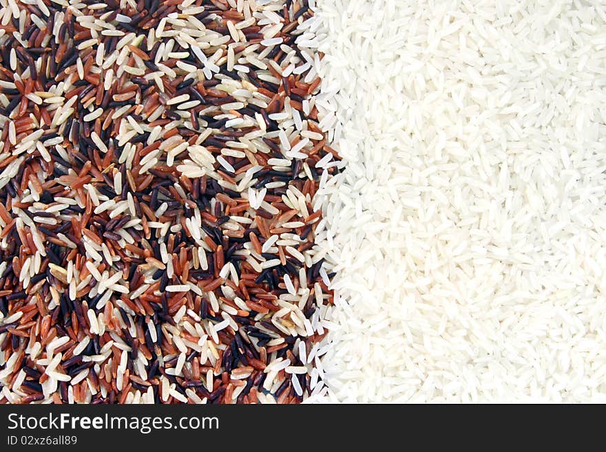 Thai Red Jasmine and Fragment magenta Organic rice half with White Jasmine rice, Background texture surface pattern. Thai Red Jasmine and Fragment magenta Organic rice half with White Jasmine rice, Background texture surface pattern