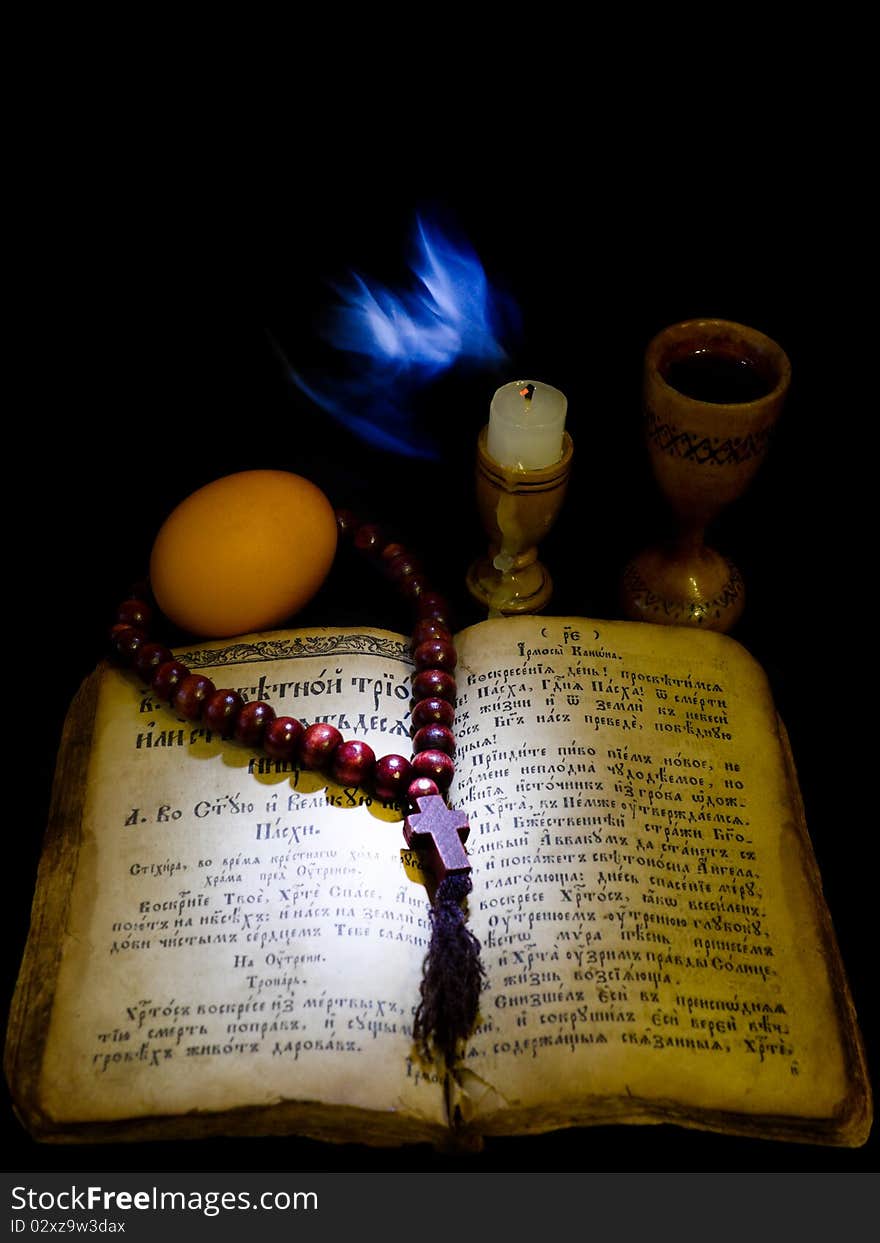 Prayer Book by candlelight in the shade.