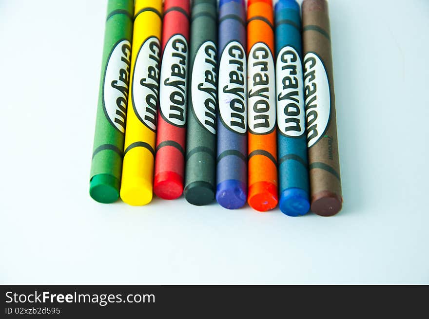 Colorful crayons on white background