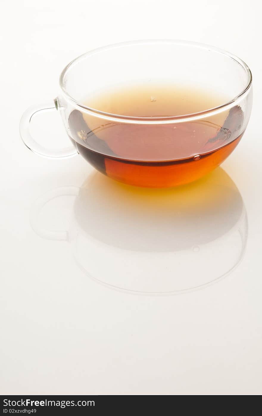 Cup of tea on white background