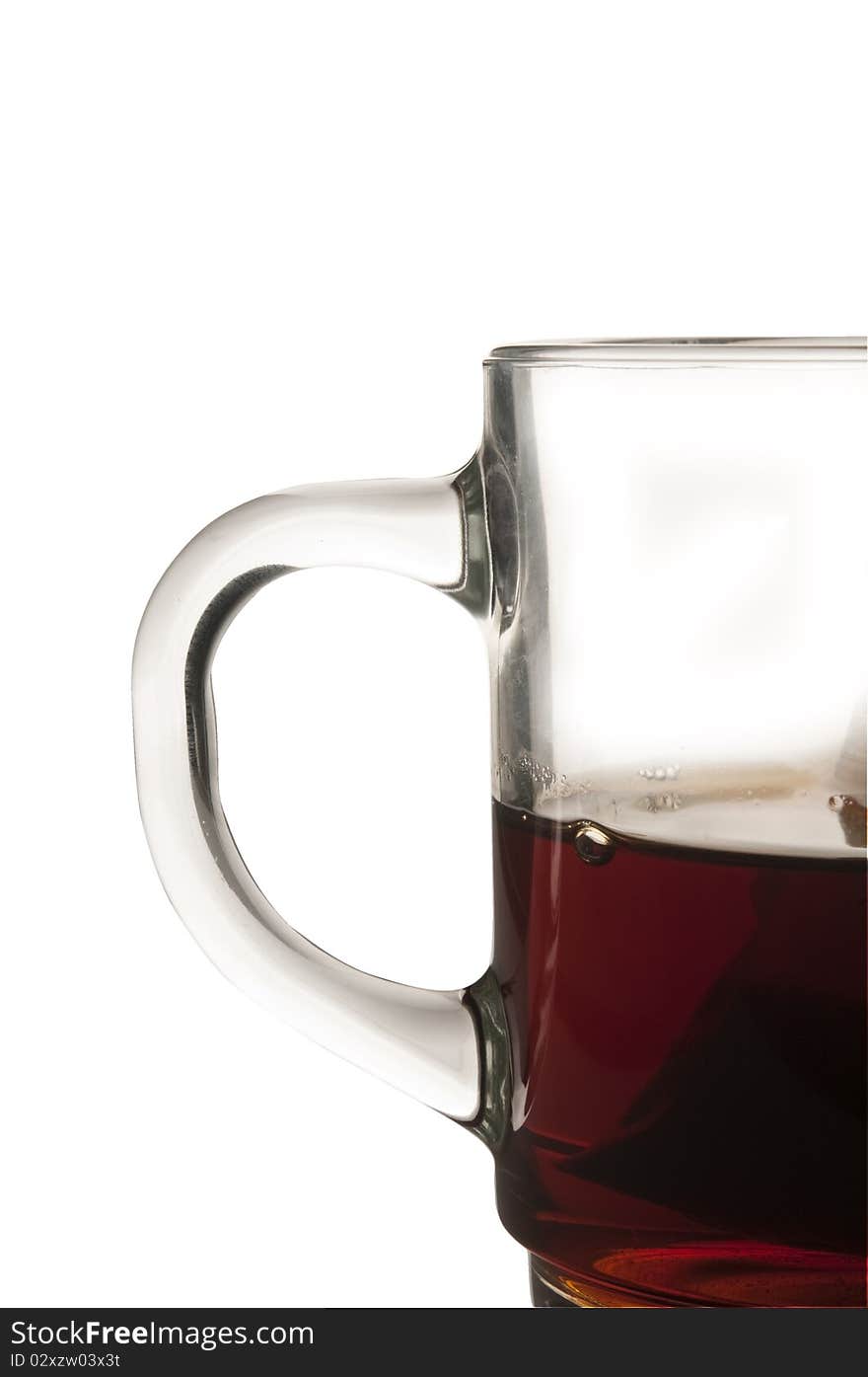 Cup of tea on white background with tea bag inside