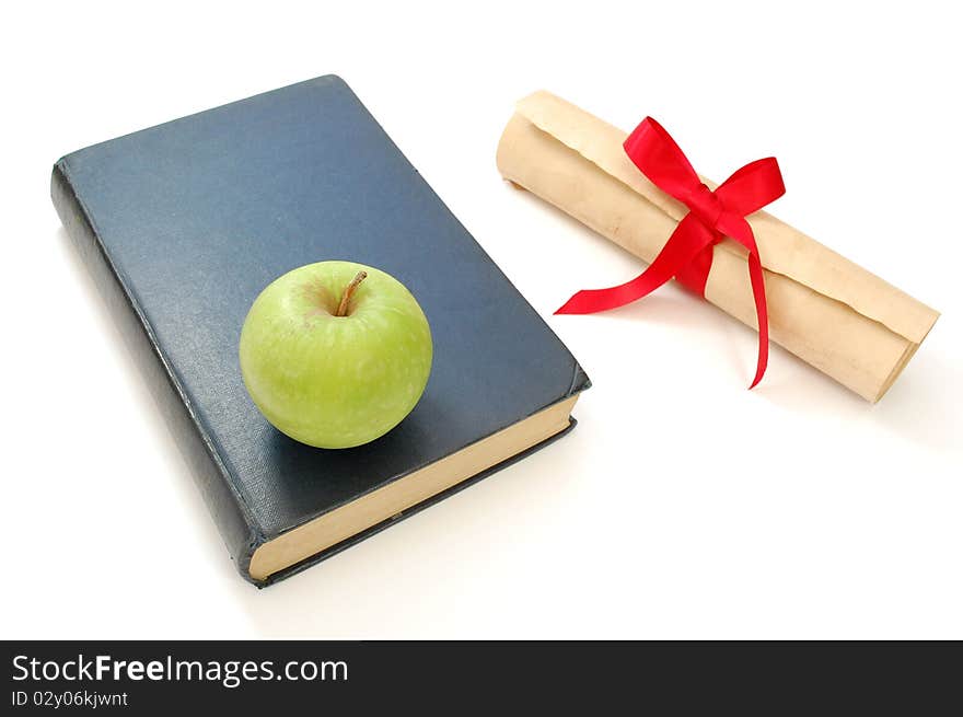 Education certificate and book isolated on a white background. Education certificate and book isolated on a white background