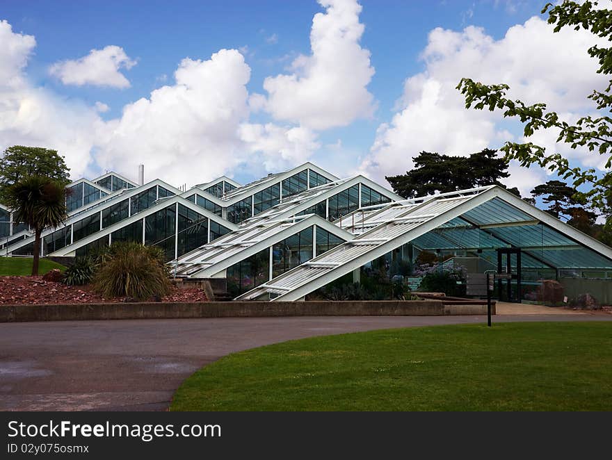 Triangle green house in a botanical garden. Triangle green house in a botanical garden