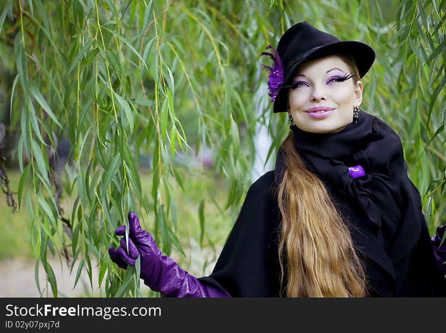 Beautiful Girl In The Autumn Park