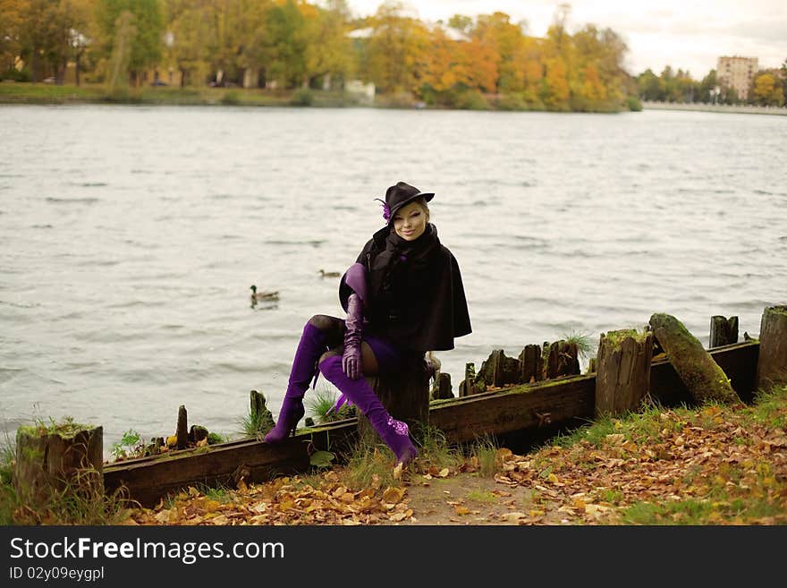 Beautiful girl in the autumn park