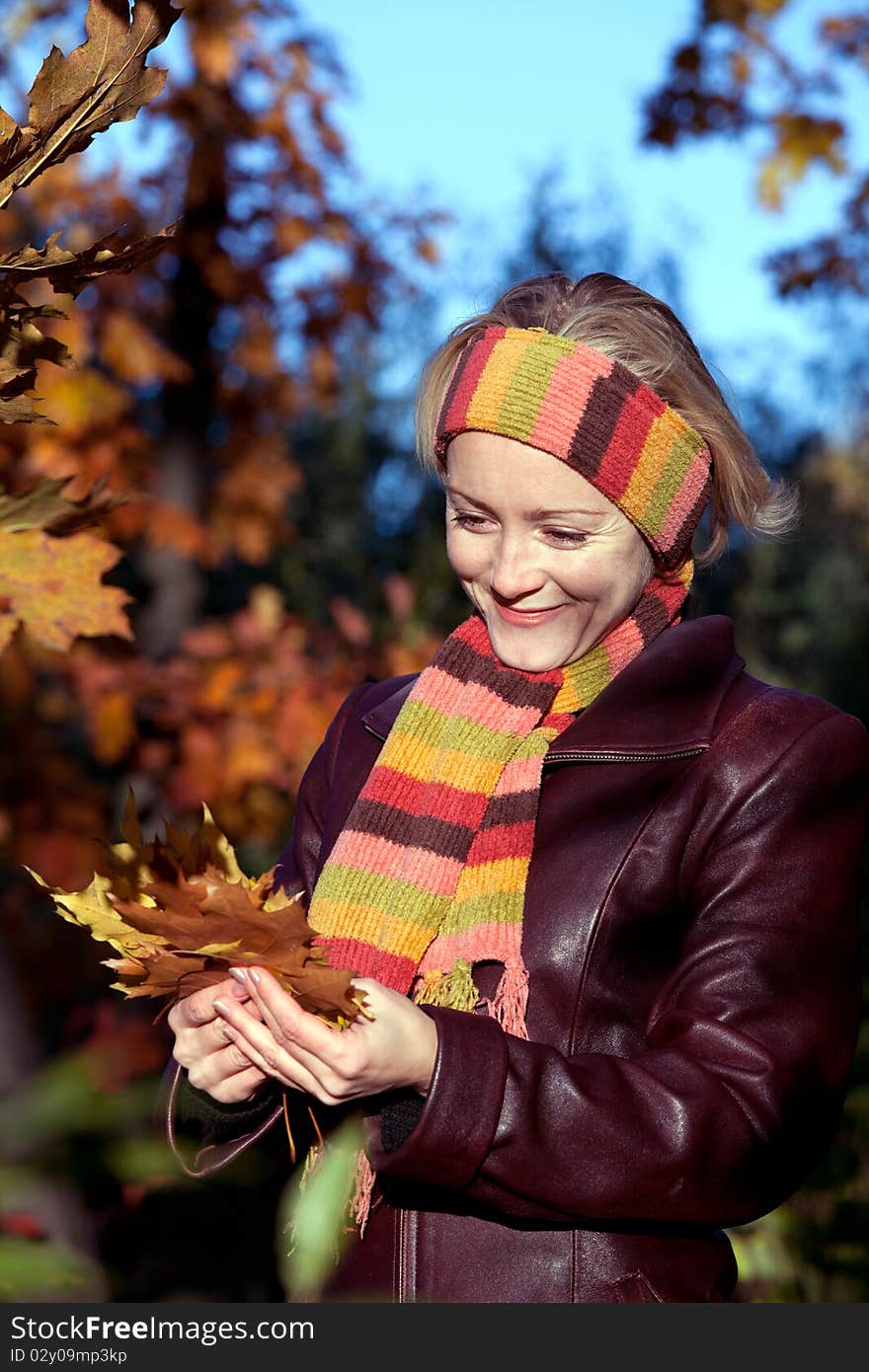 Young woman in autumn park