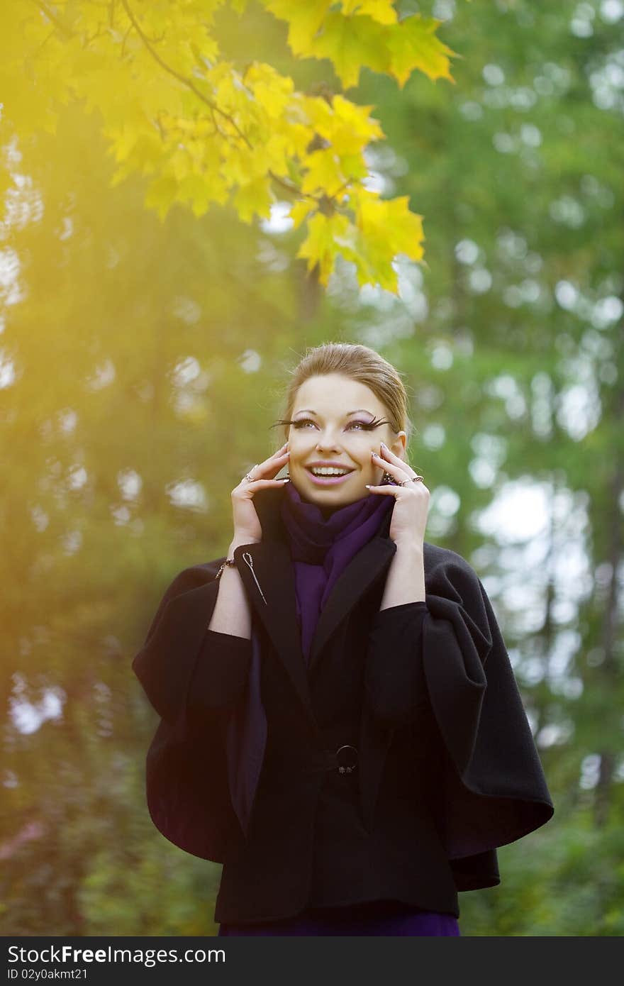 Beautiful girl in the autumn park