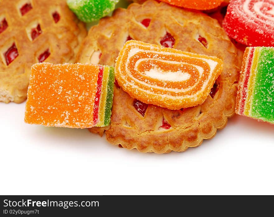 Colorful jelly in sugar and biscuits isolated on white