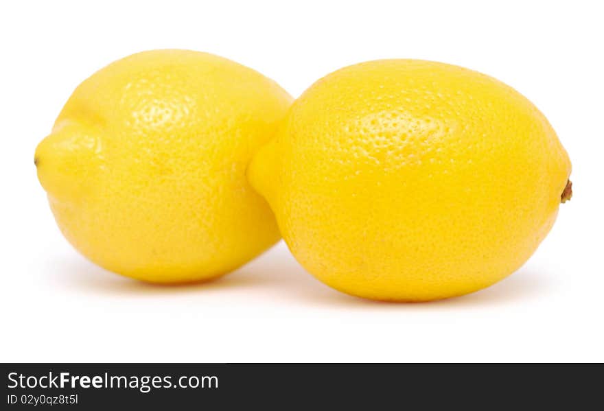 Two juicy lemons isolated on a white background