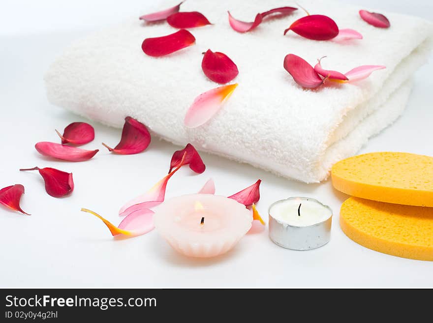 A set of aroma therapy beside the white towel. A set of aroma therapy beside the white towel