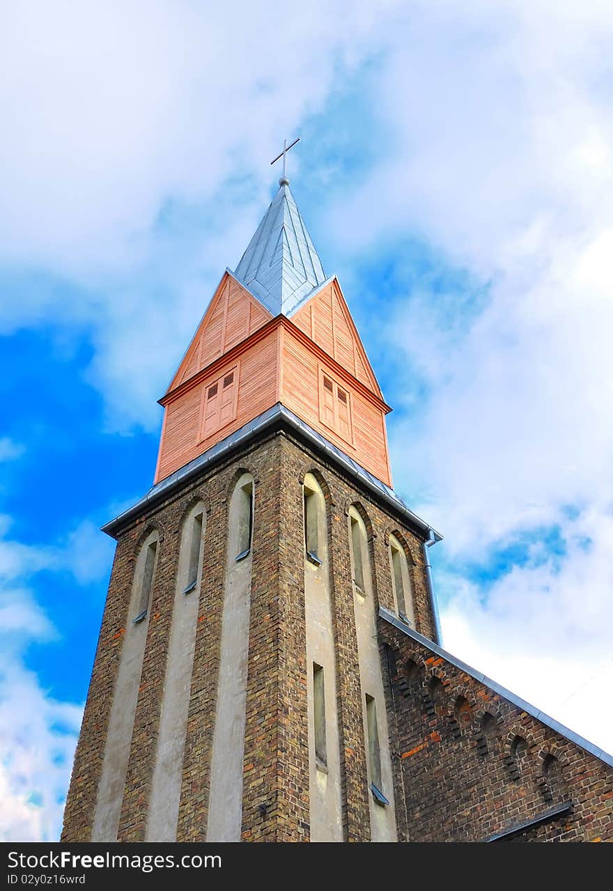 Catholic church on a blue sky background