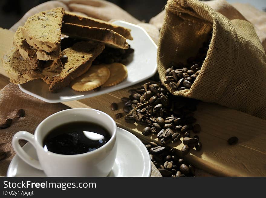 Breakfast with coffee, bread and biscuits.