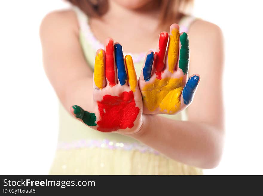 Little girl with hands painted in colorful paints ready for hand prints. Little girl with hands painted in colorful paints ready for hand prints