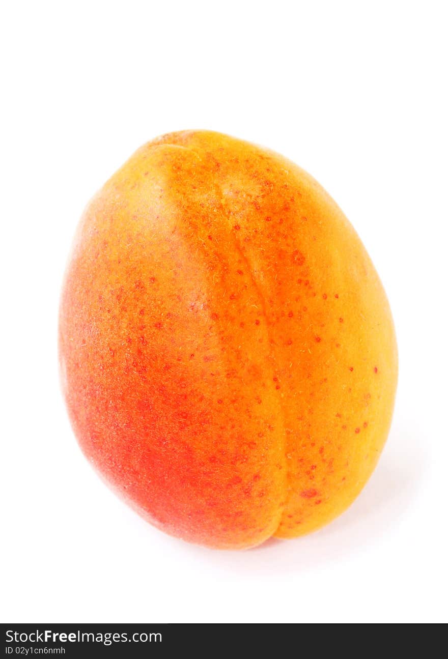 Fresh and ripe apricot isolated on a white background