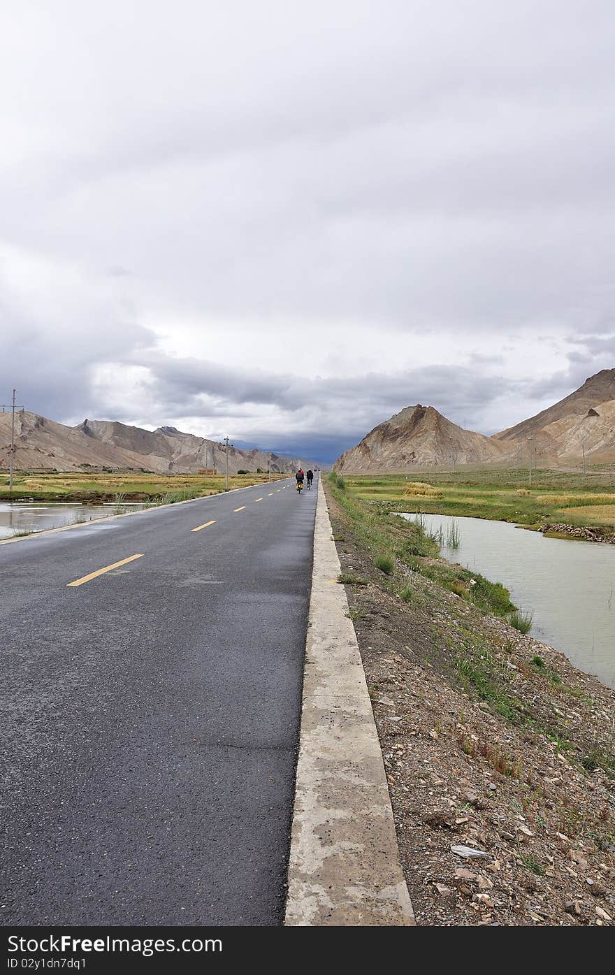 The highway of tibet is wide,open and opaque.What a beautiful landscape. The highway of tibet is wide,open and opaque.What a beautiful landscape.