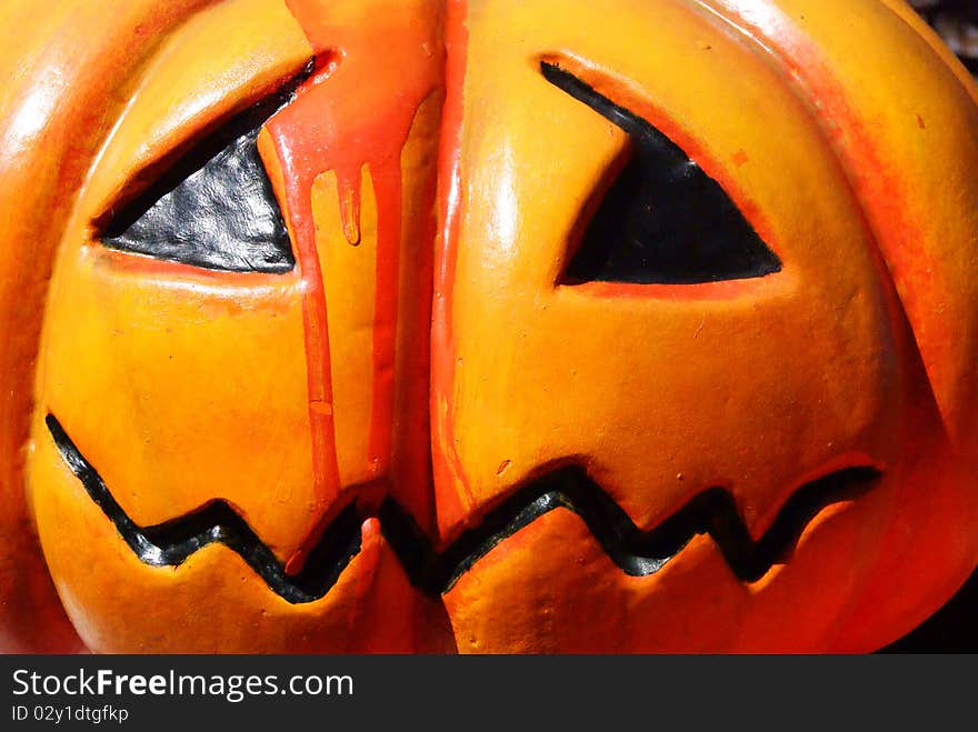 An orange halloween pumpkin with blood