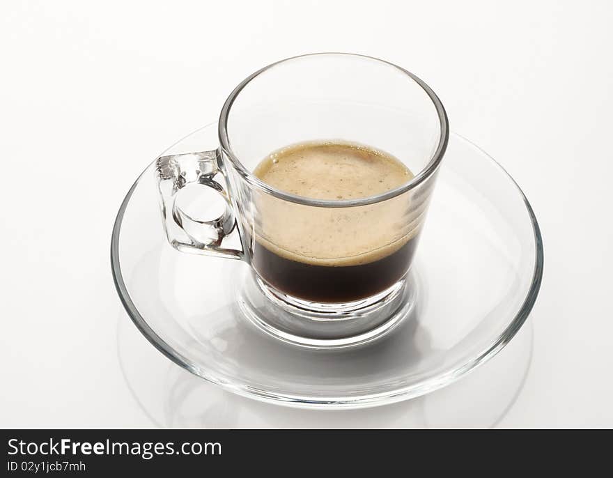 A cup of coffe espresso on white. A cup of coffe espresso on white