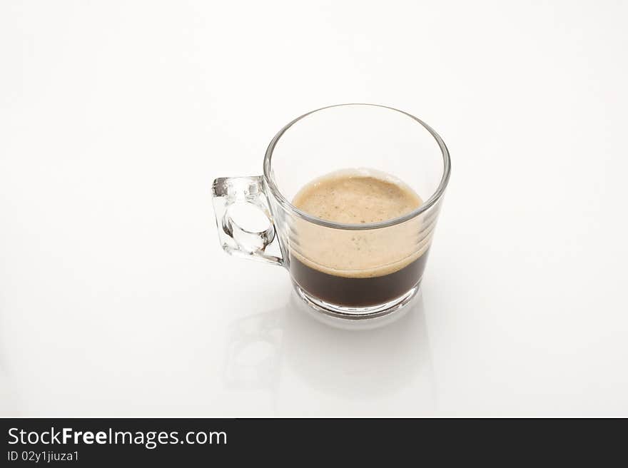 A cup of coffe espresso on white. A cup of coffe espresso on white