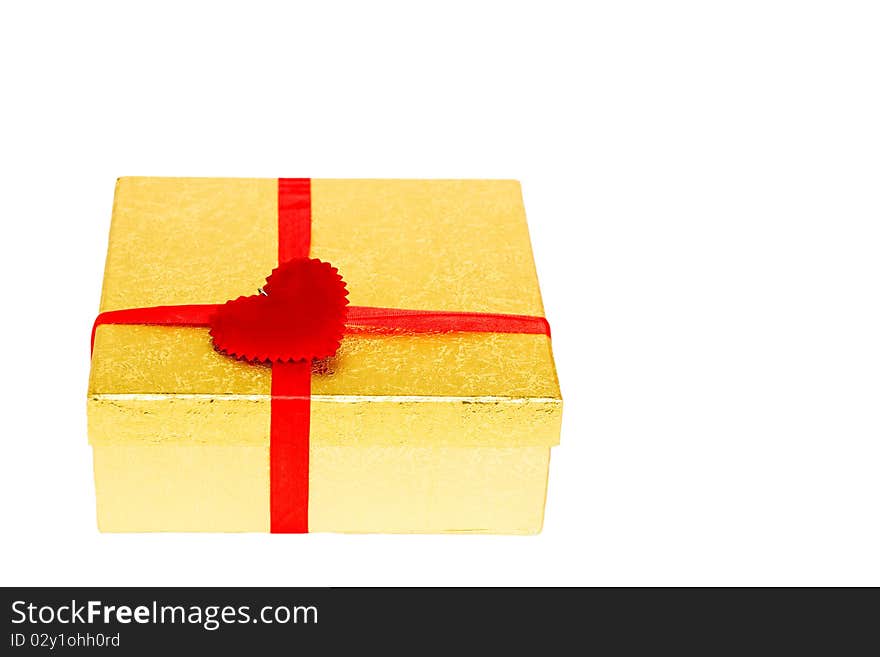 Gold box with red heart on white