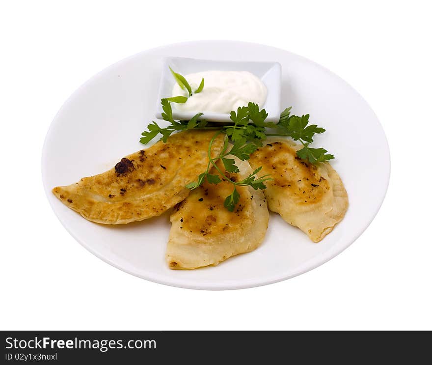 Pelmeni with a shrimp on a plate. Pelmeni with a shrimp on a plate