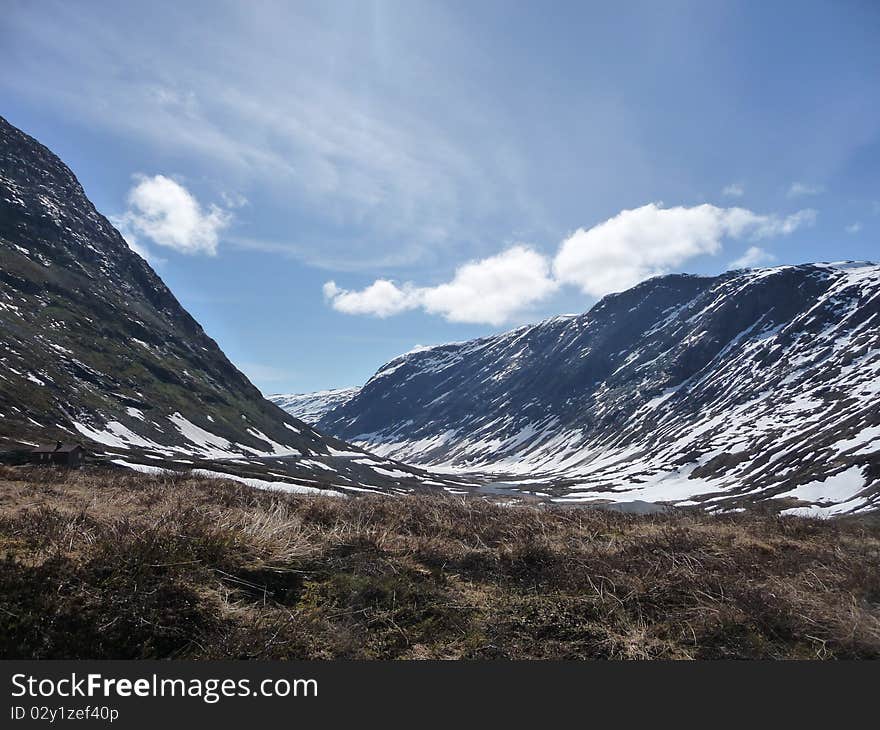 Snowy Mountains In Norway