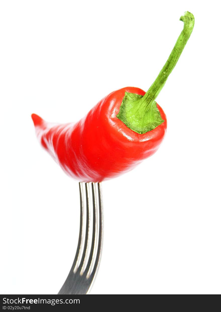 Red chili pepper on a fork