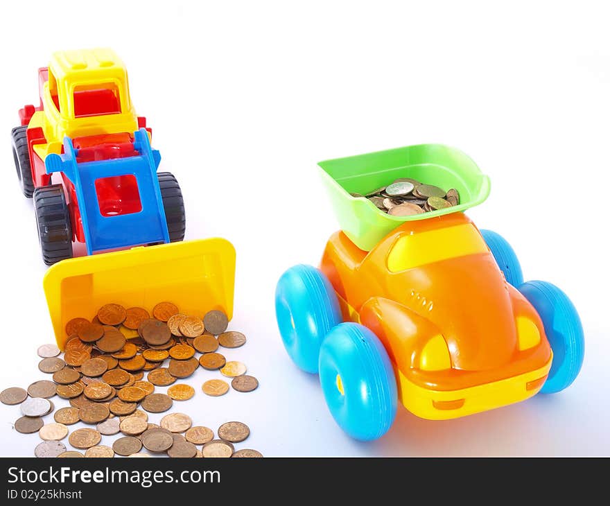 Toy loader loads the coin into the truck. Investment, loans.