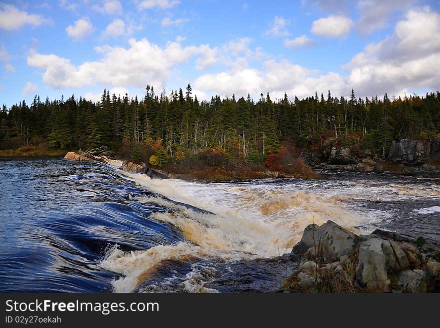 Wild and fast running water in the wilds of Newfoundland Canada. Wild and fast running water in the wilds of Newfoundland Canada.