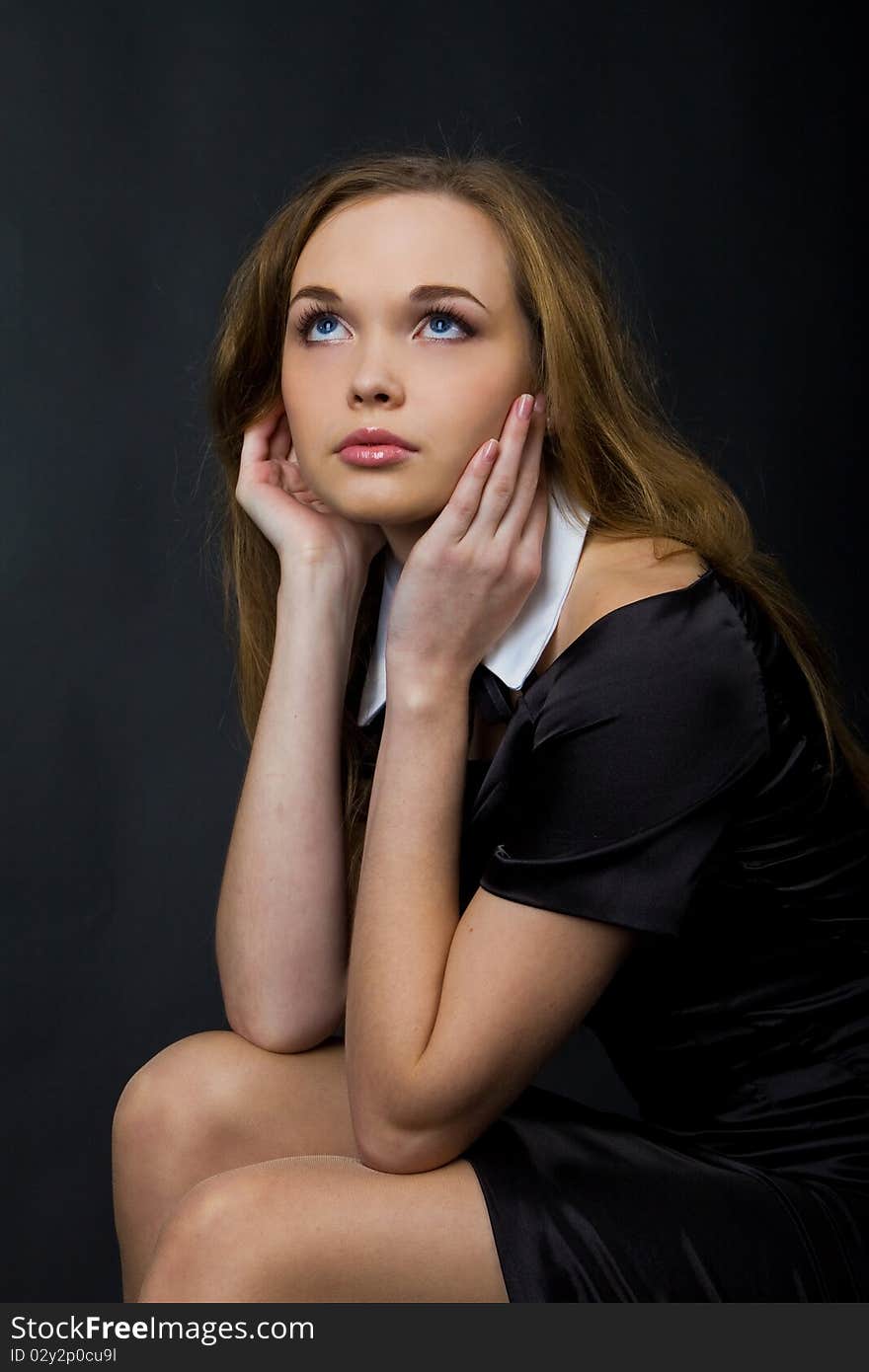 Portrait of beautiful young girl in studio