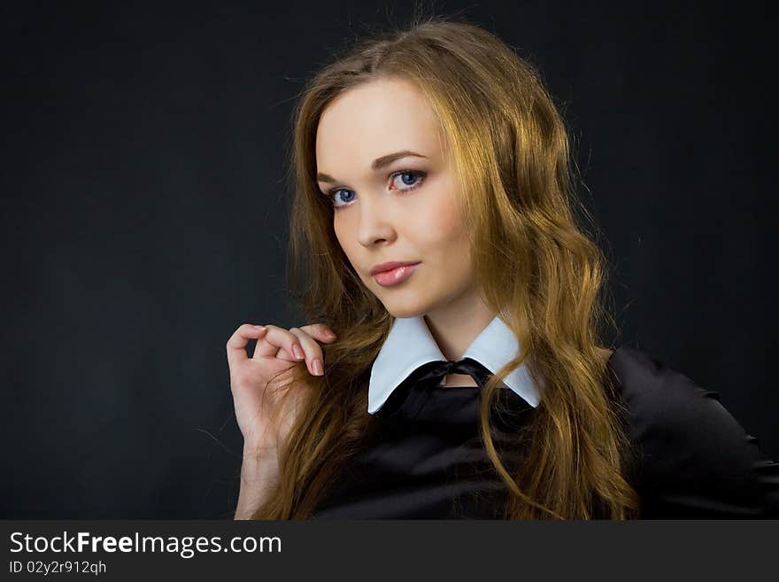 Portrait of beautiful young girl in studio