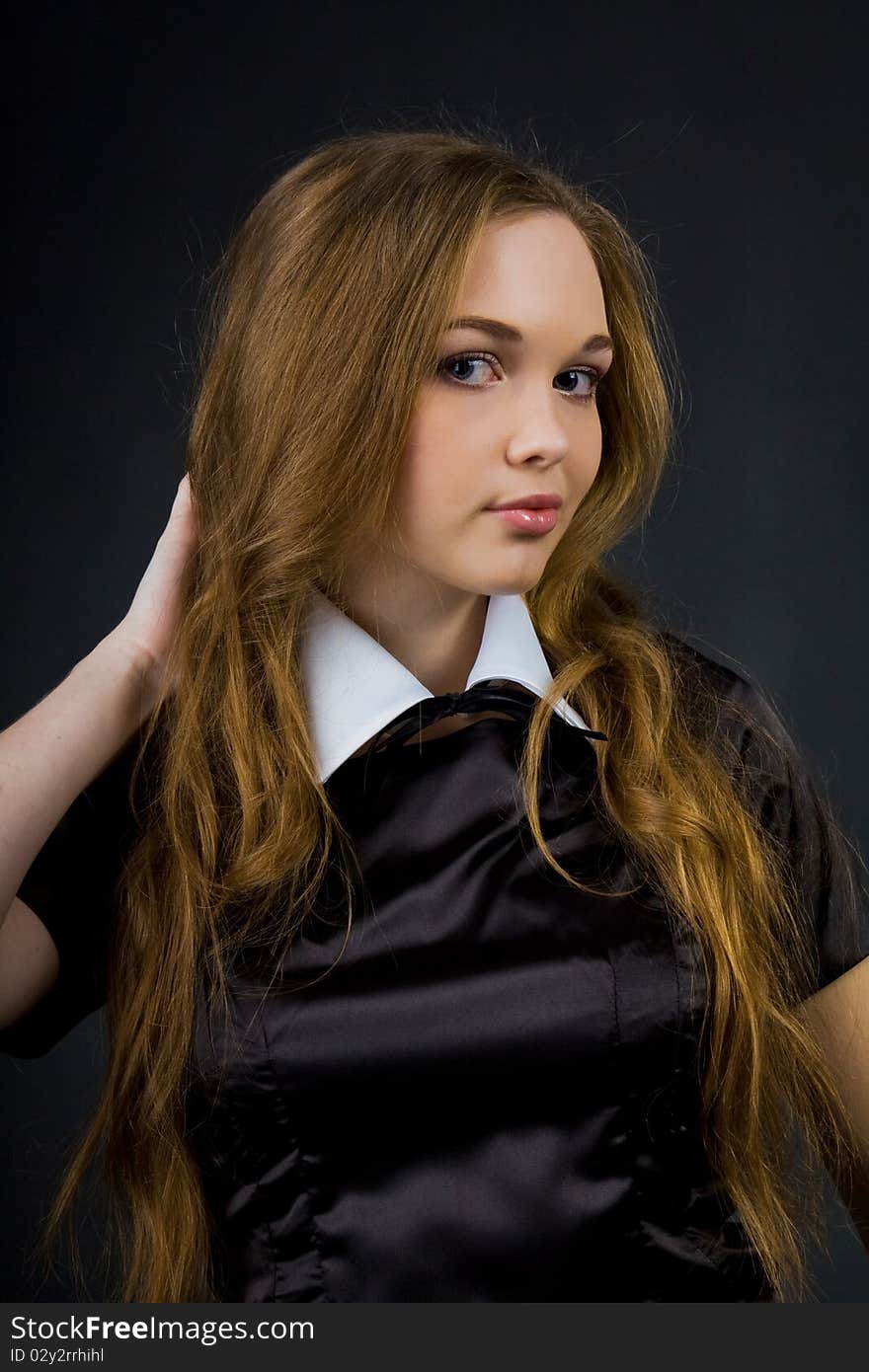 Portrait of beautiful young girl in studio