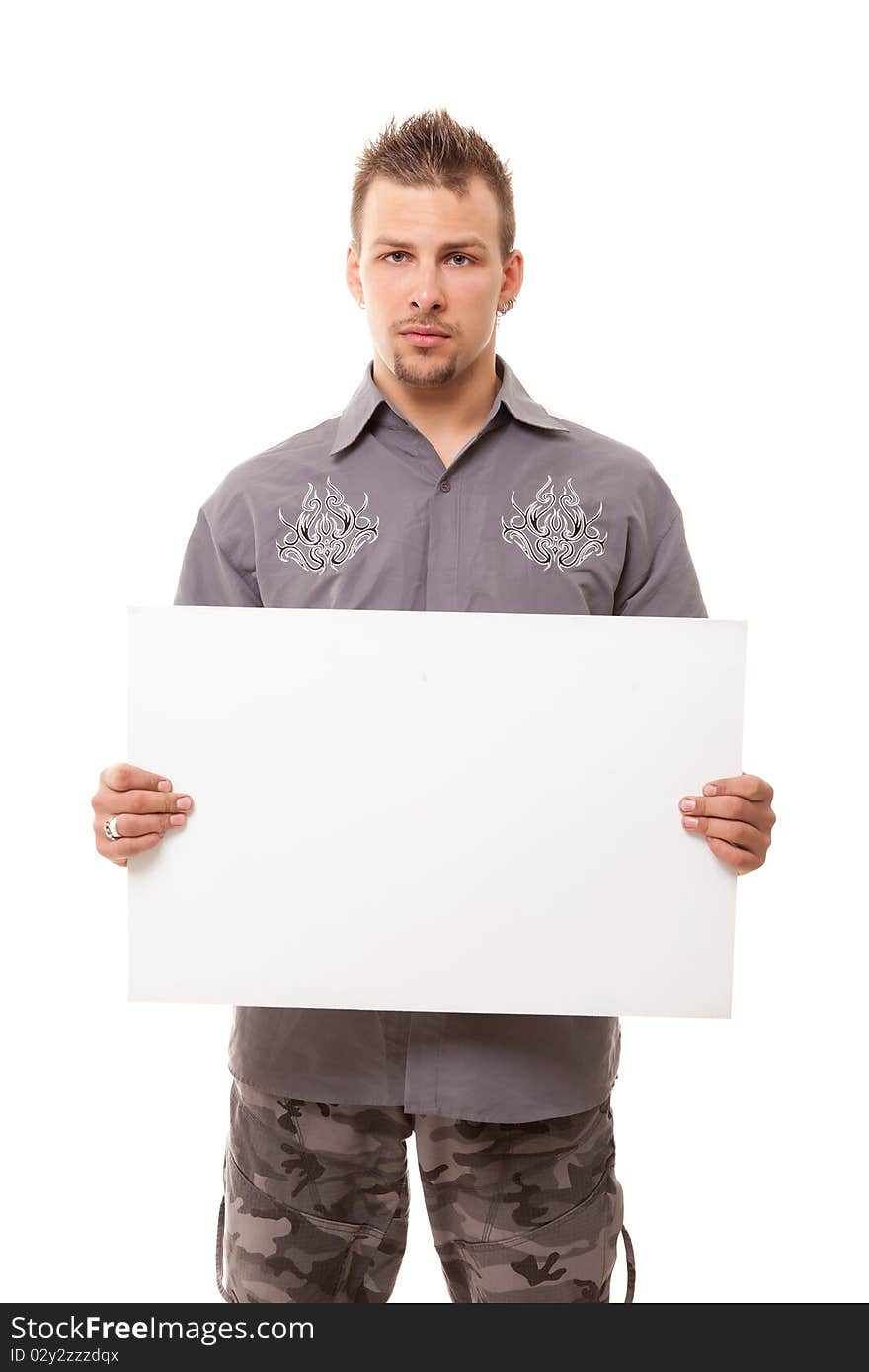 Serious young handsome man with white clear board on white background. Serious young handsome man with white clear board on white background