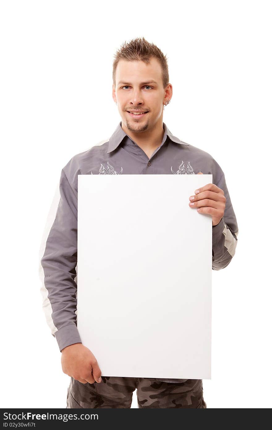 Smiling young handsome man with white clear vertical board on white background. Smiling young handsome man with white clear vertical board on white background