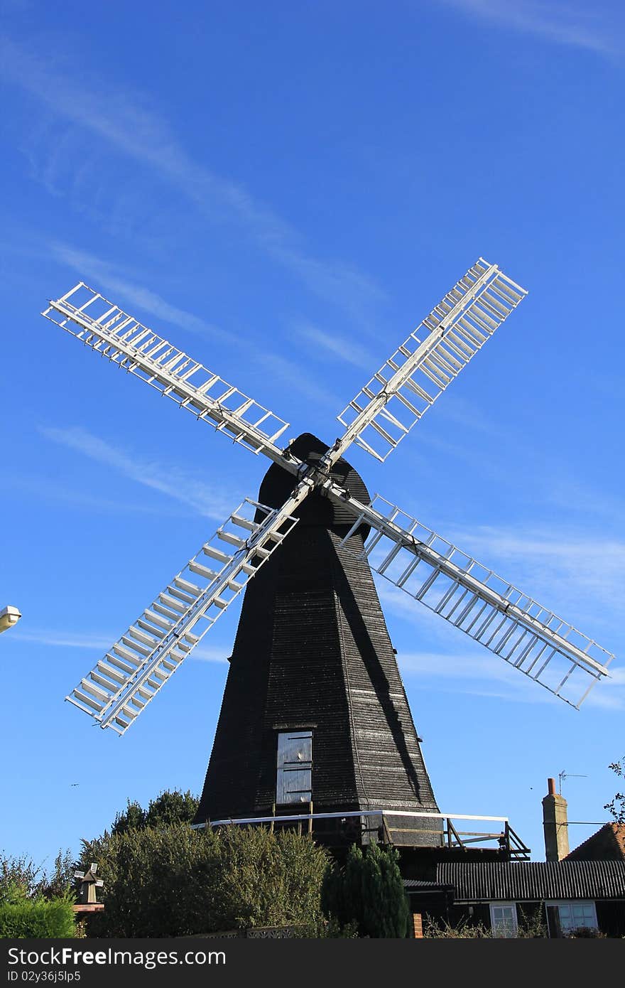 Old style wind mill located in Kent, England. Old style wind mill located in Kent, England