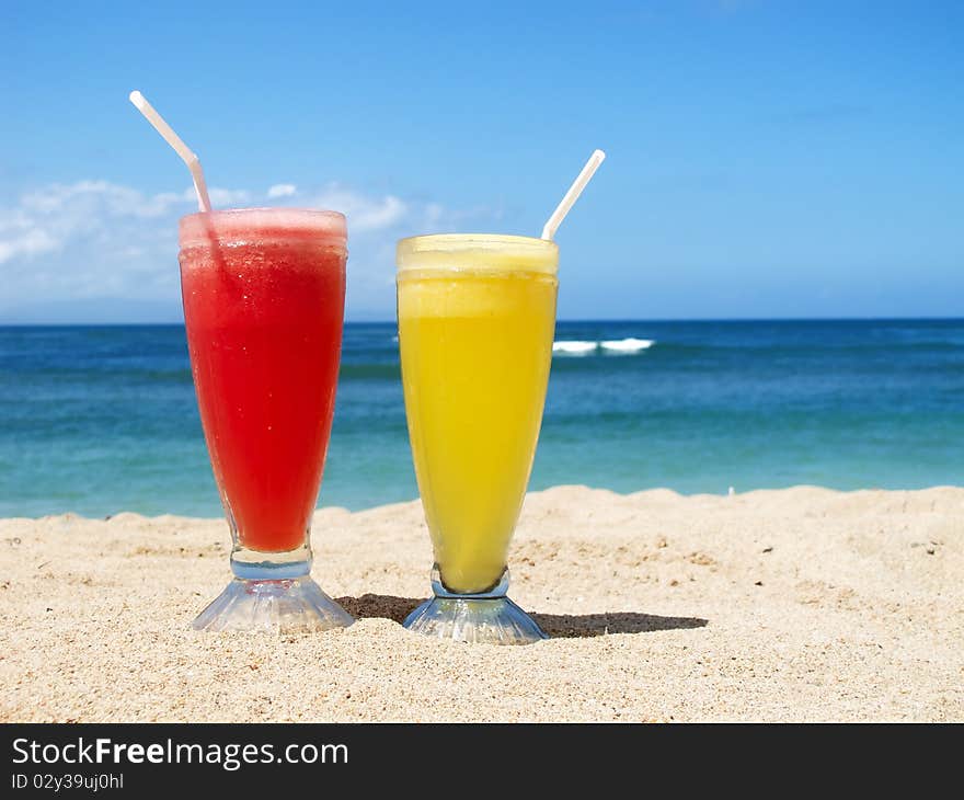 Fresh fruit cocktail on a tropical island beach