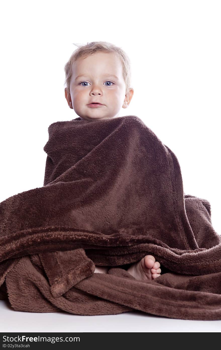 Beautiful Baby Under A Brown Towel