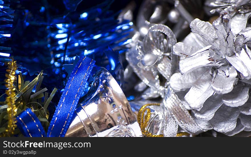 Christmas silver bells and decorative cone close-up. Christmas silver bells and decorative cone close-up