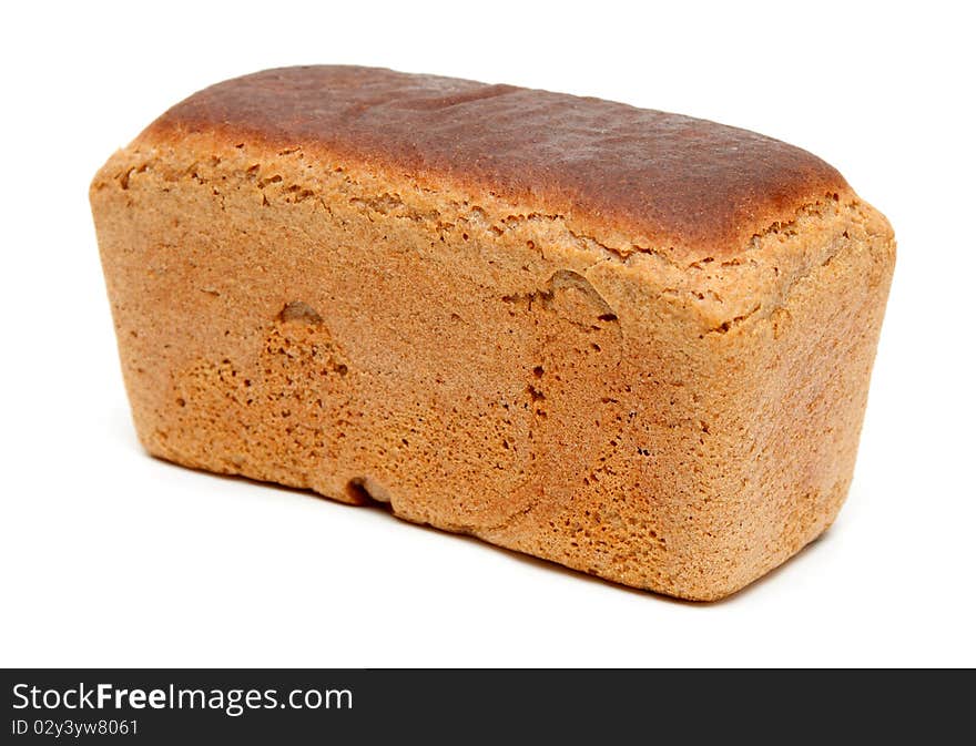 Loaf of fresh appetizing bread on white background