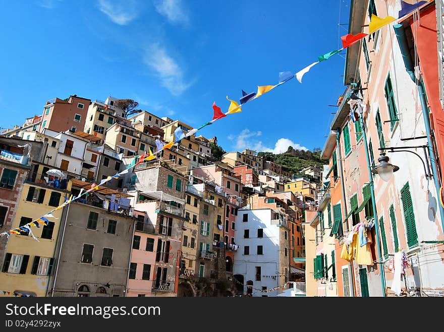 A view of the village of Riomaggiore, one of the Cinque Terre, in Liguria, Italy. A view of the village of Riomaggiore, one of the Cinque Terre, in Liguria, Italy.