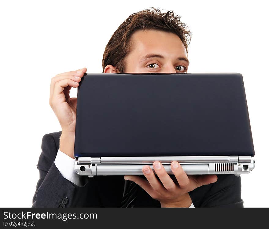 Businessman look out from laptop. Portrait isolated on white