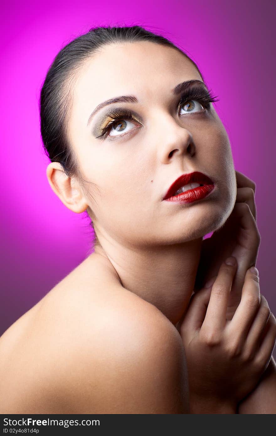 Beautiful Woman Over Color Background