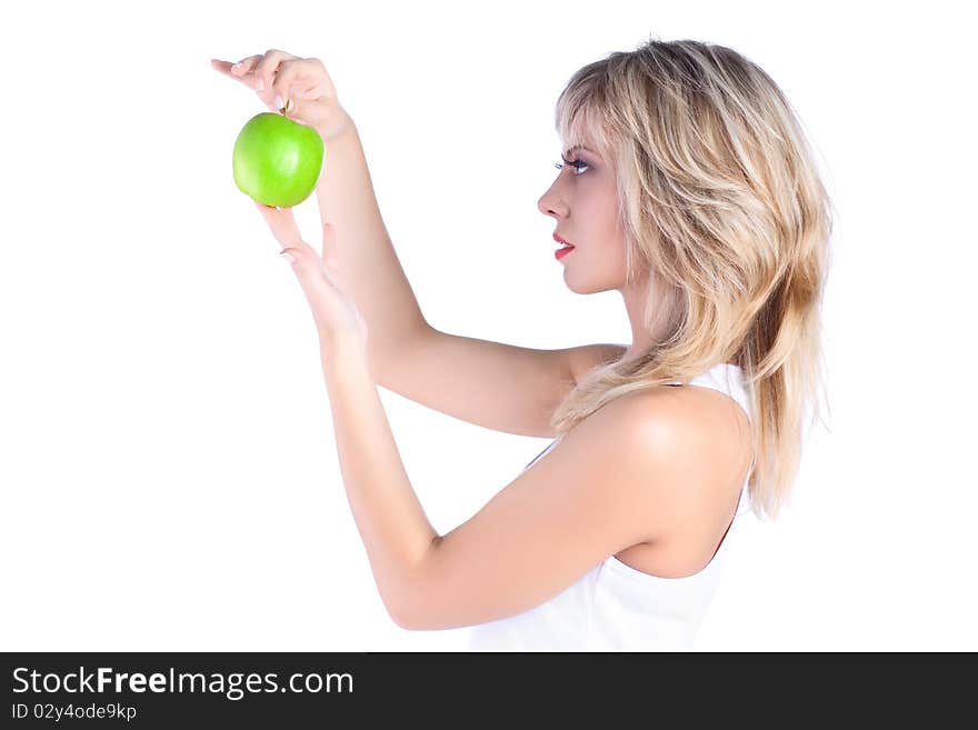 Young girl over white background with apple. Young girl over white background with apple