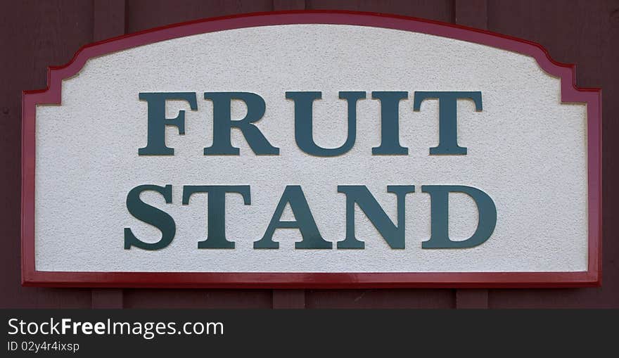 Sign outside a fruit stand business used for advertising. Sign outside a fruit stand business used for advertising