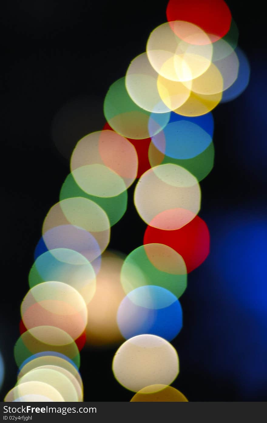 Photo of bokeh lights on black background. Photo of bokeh lights on black background