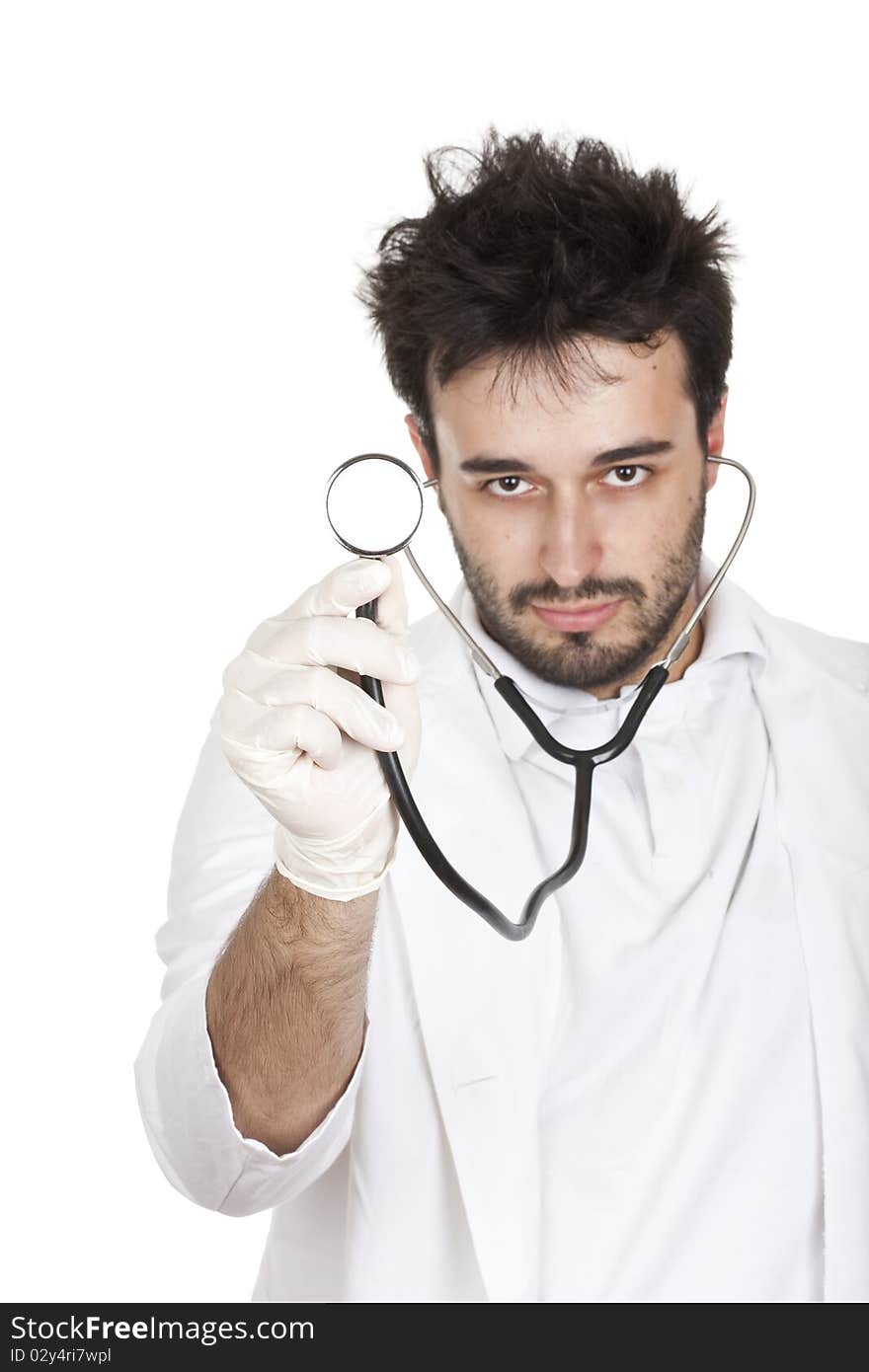 Young doctor holding a stetoscope isolated on white.