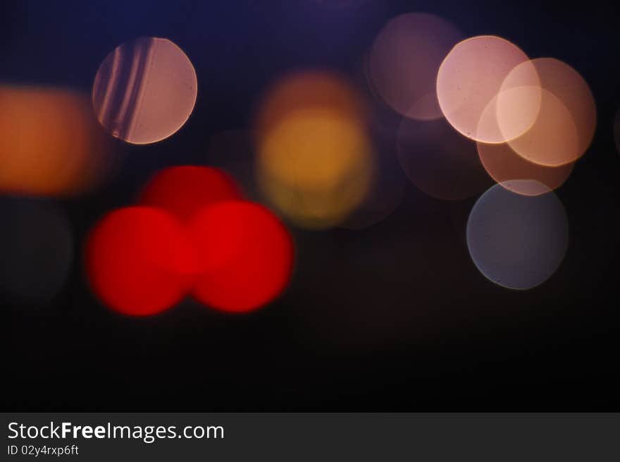 Photo of bokeh lights on black background. Photo of bokeh lights on black background