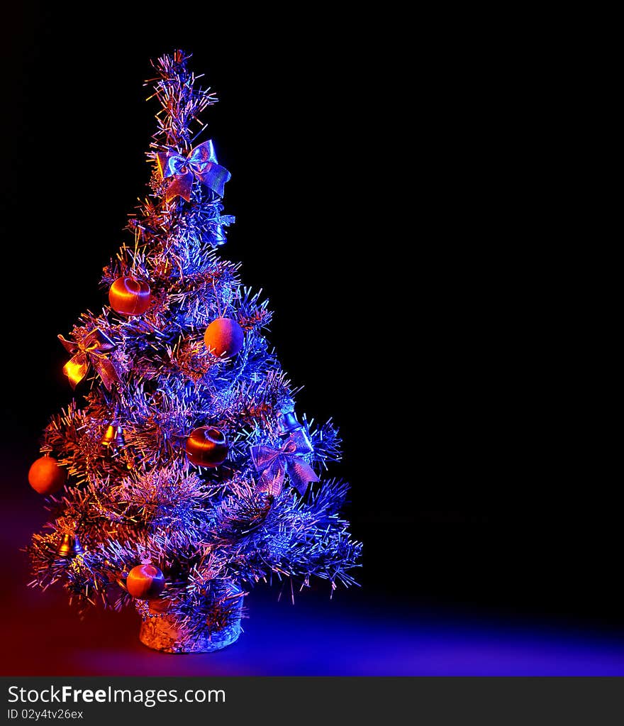 Christmas tree on a dark background. Christmas tree on a dark background