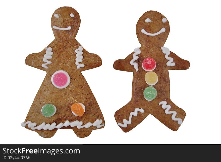 A Gingerbread Couple, isolated on white. Photographed in a studio.