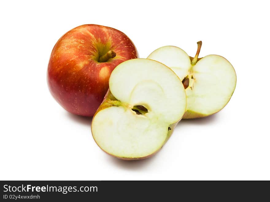 Whole and cut apples isolated on white