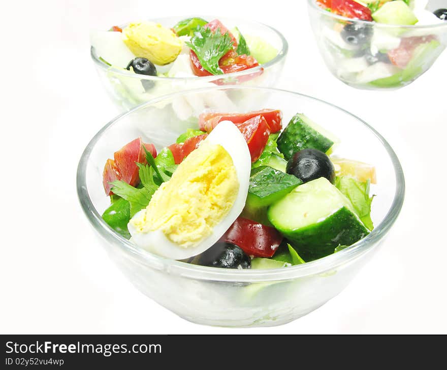 Greek salad with cheese olive and tomato in little bowls. Greek salad with cheese olive and tomato in little bowls